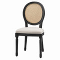 Chaise en bois noir avec dossier en rotin et assise en lin beige
