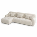 Canapé d'angle en tissu bouclé ivoire avec méridienne